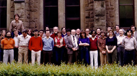 Staff and students of the Department of Computer Science, approximately 1984: (l to r) Michael Maher, Jean-Louis Lassez, Jacek Gibert (front), Glenn Farall, Bill Flower, John Shepherd, Peter Eden, Isaac Balbin, Rodney Topor (front), Peter Lamb (obscured), Dick Hamlet [visitor from Maryland], Liz Sonenberg, Paul Dunn, Ben Warden, Peter Poole, David Danks, Julie [??], Rex Harris, Rao Kotagiri, Jamie Thom, Ian Richards, Steven Lynch, Prue Downie, John Lloyd, Jurij (George) Semkiw, Joxan Jaffar, Peter Thorne. [Photo provided by Ben Warden, scanned by Liz Sonenberg.] 